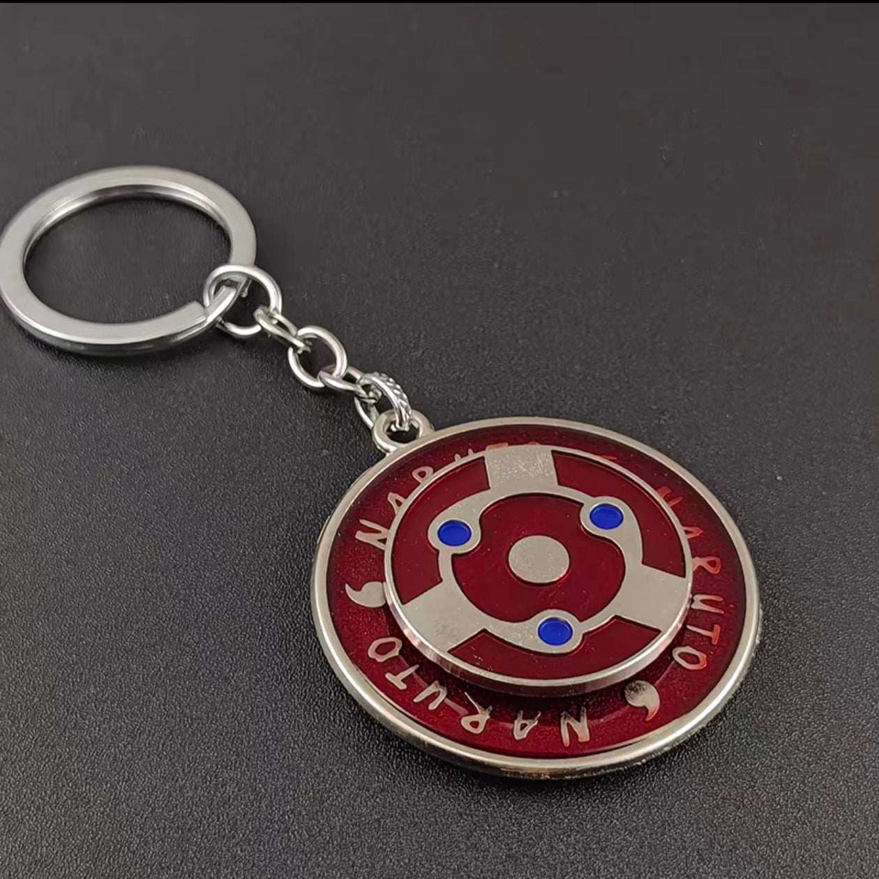 Narutoo Sharingan Rotatable Keychain - Spinning Eye Design Accessory with Detachable Charm